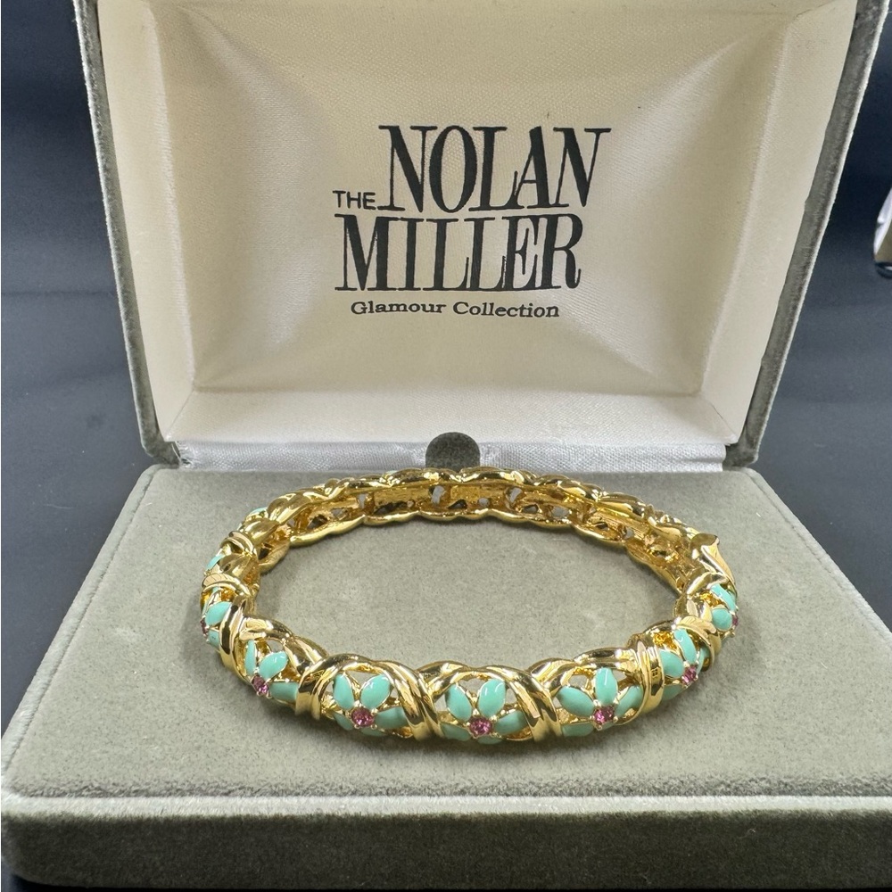 Vintage NOLAN MILLER Hinged Bangle Bracelet
Gold Tone & Turquoise Enamel Flowers